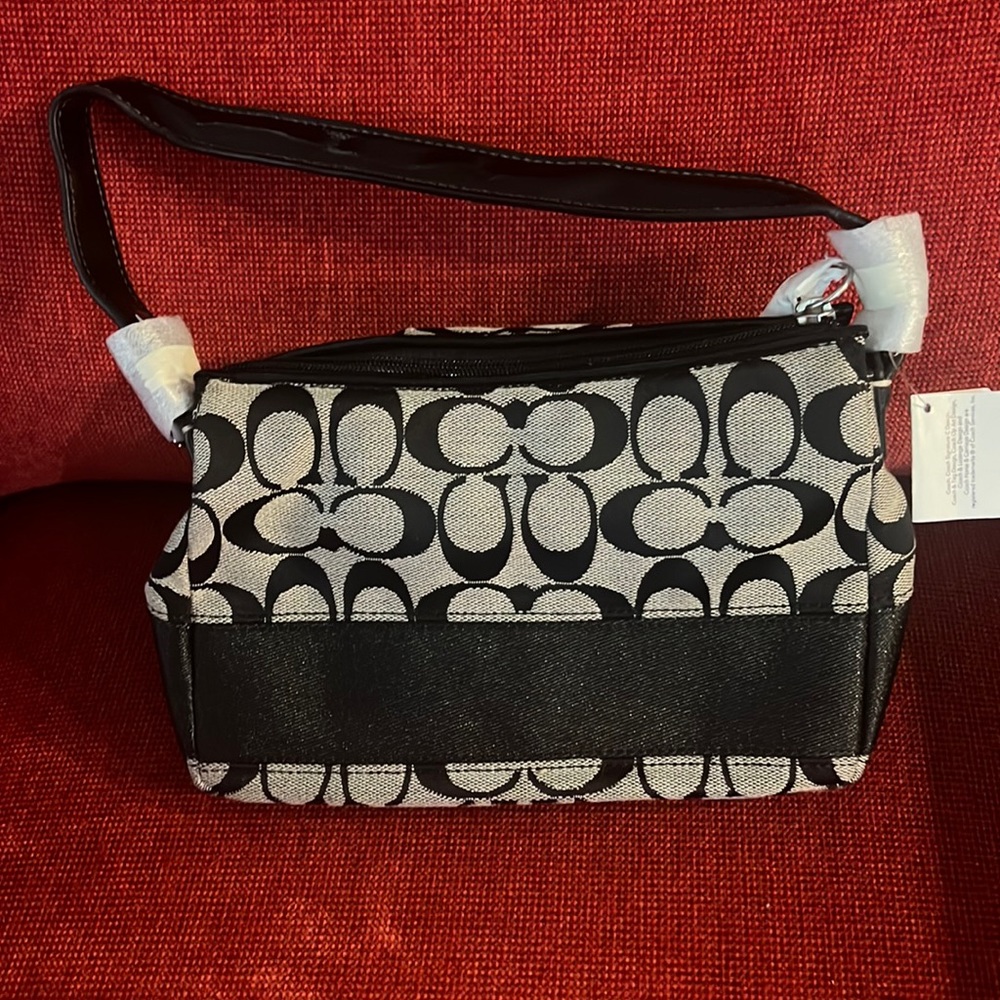Coach sig stripe tp handle